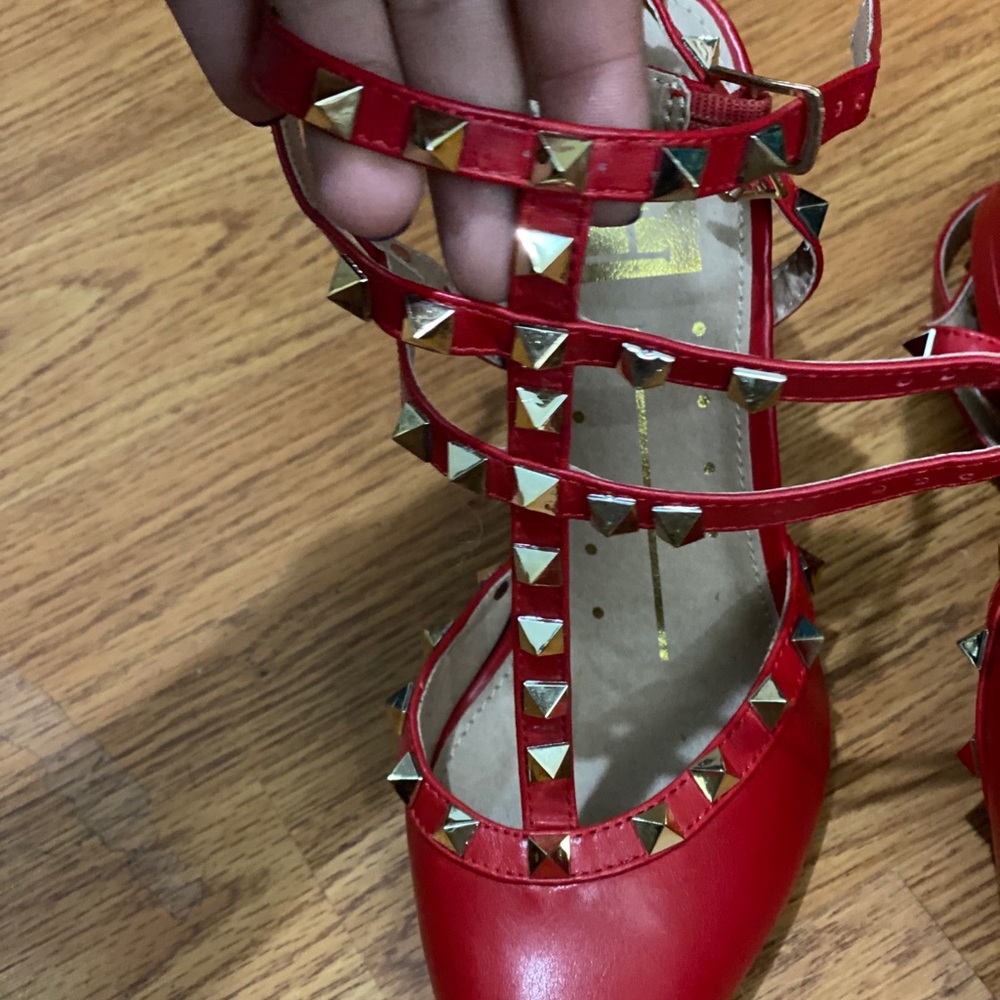 Red studded heel